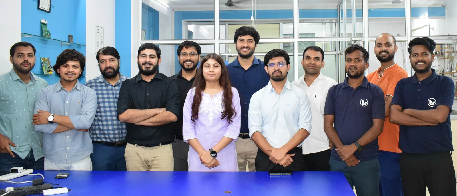 The full Techshlok team standing together in the office